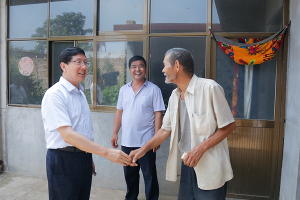 薛季民董事长慰问结对助扶户